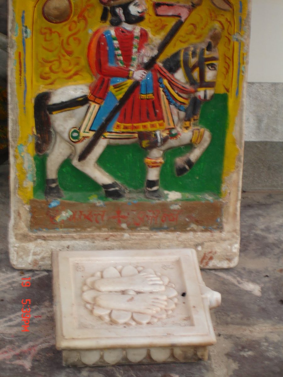 Original marble paduka footprints
